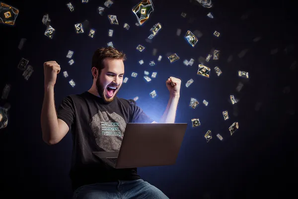 একজন পুরুষ তার ল্যাপটপে জয়ের মুহূর্ত উদযাপন করছেন, চারপাশে ভাসছে গেমিং আইকন—যা CBAJI গেমসের উত্তেজনাকে প্রকাশ করে।